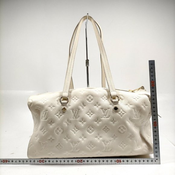 authentic LOUIS VUITTON White Monogram Empreinte Leather Inspiree Bag - Picture 6 of 15